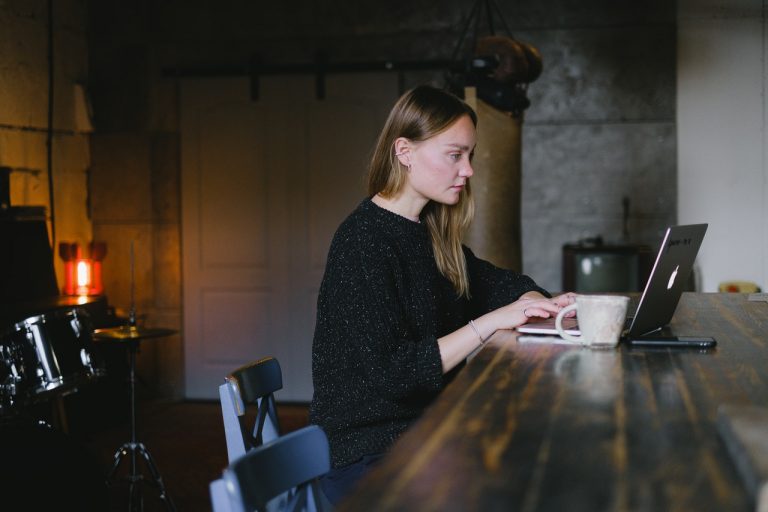 woman using her laptop