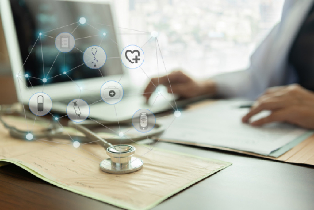 doctor using health tech apps in his computer