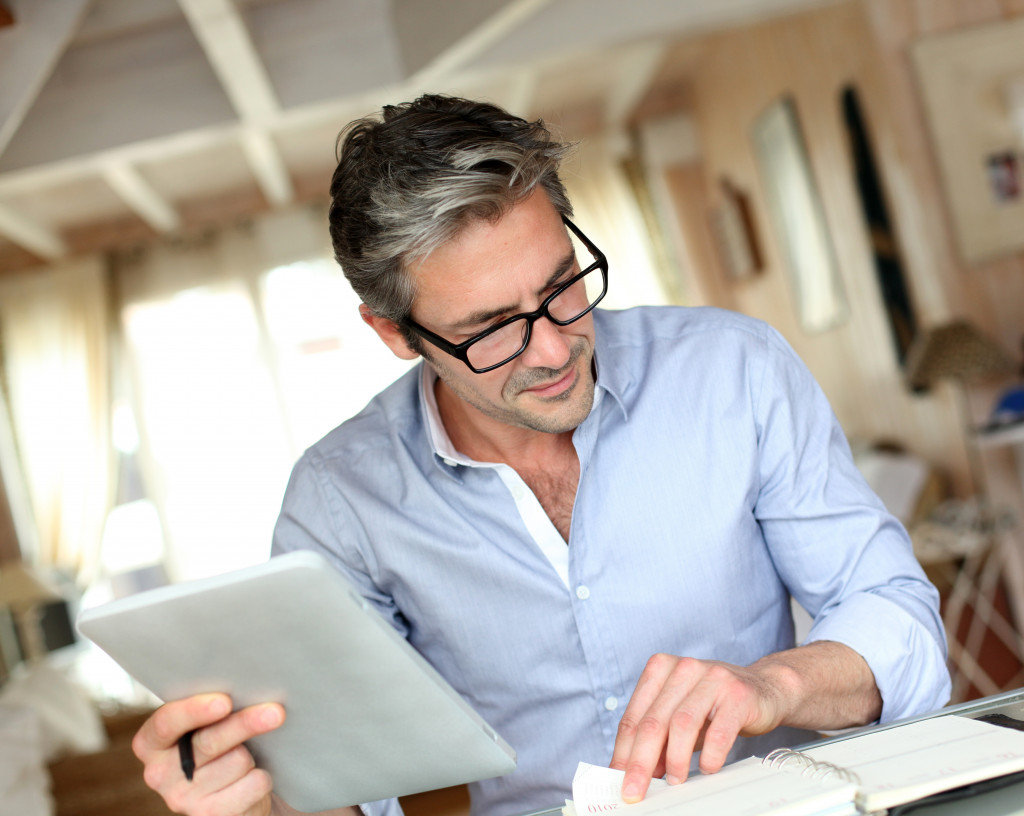 businessman using a gadget