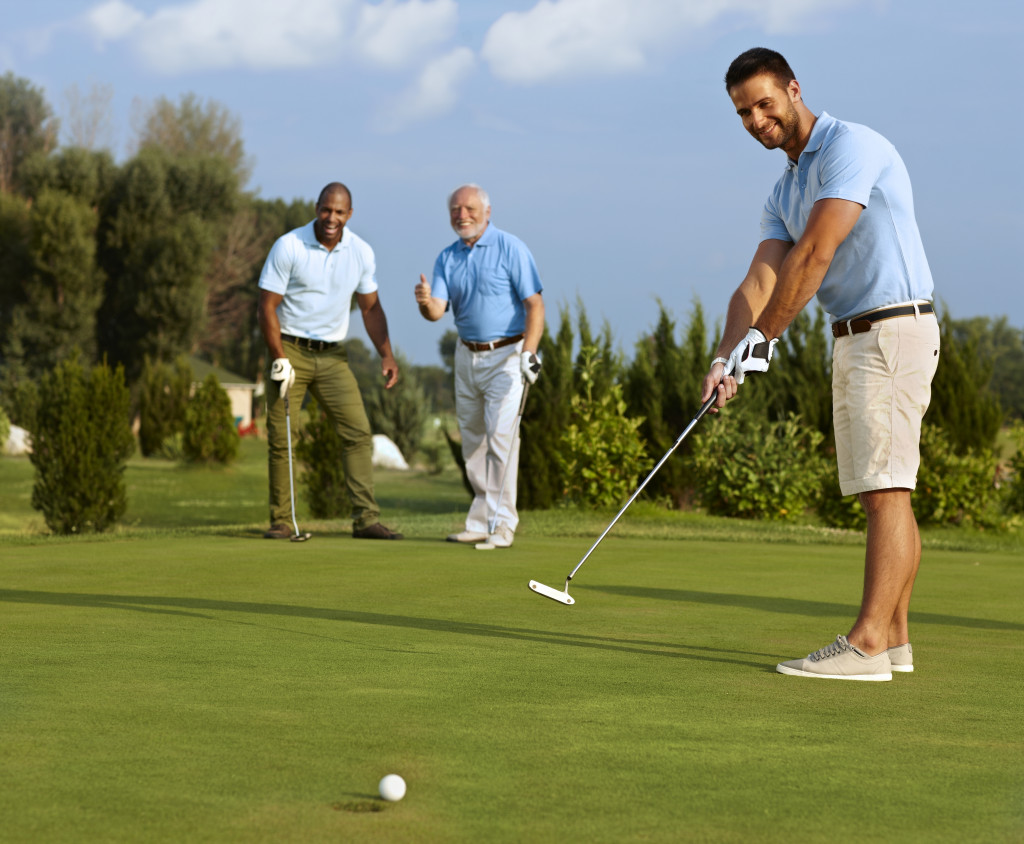 men playing golf